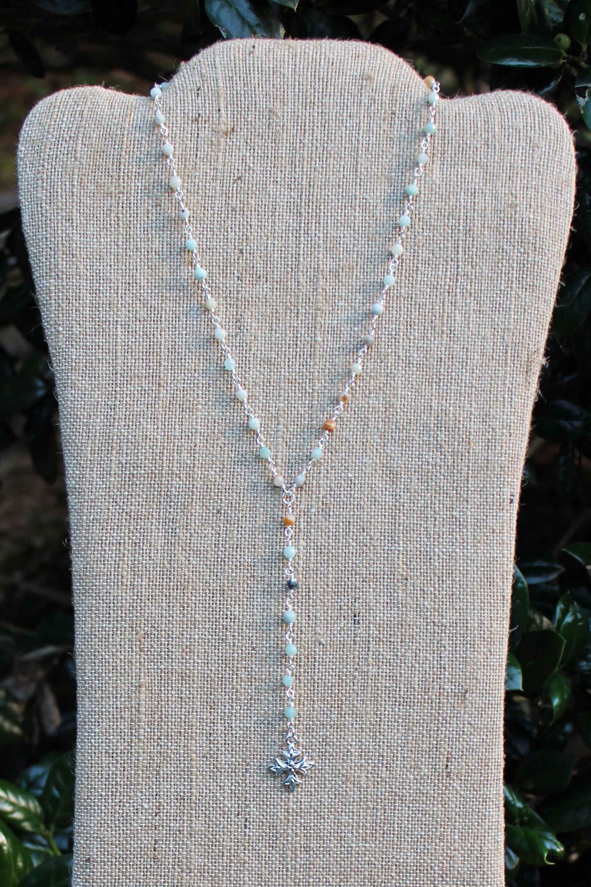 N089PC; Small Fancy Trinity Cross; On 3.5” Drop Chain; Faceted 3mm Amazonite; Silvertone Chain; Approximately 17 inches; ; Majestees