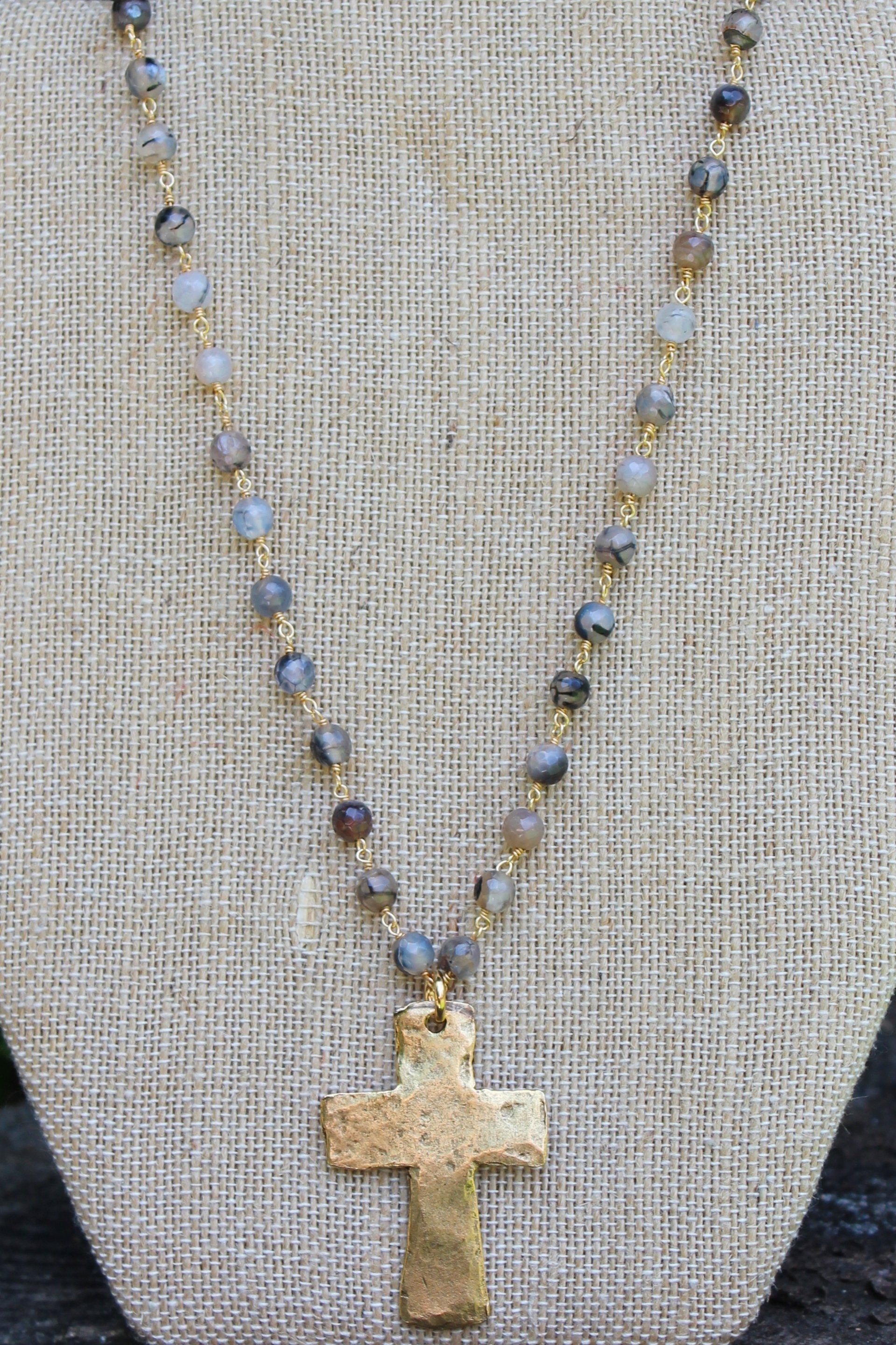 N113GE; Large Goldtone Cross; 5mm Black Agate Goldtone Chain; Approximately 16 inches; ; ; ; Majestees