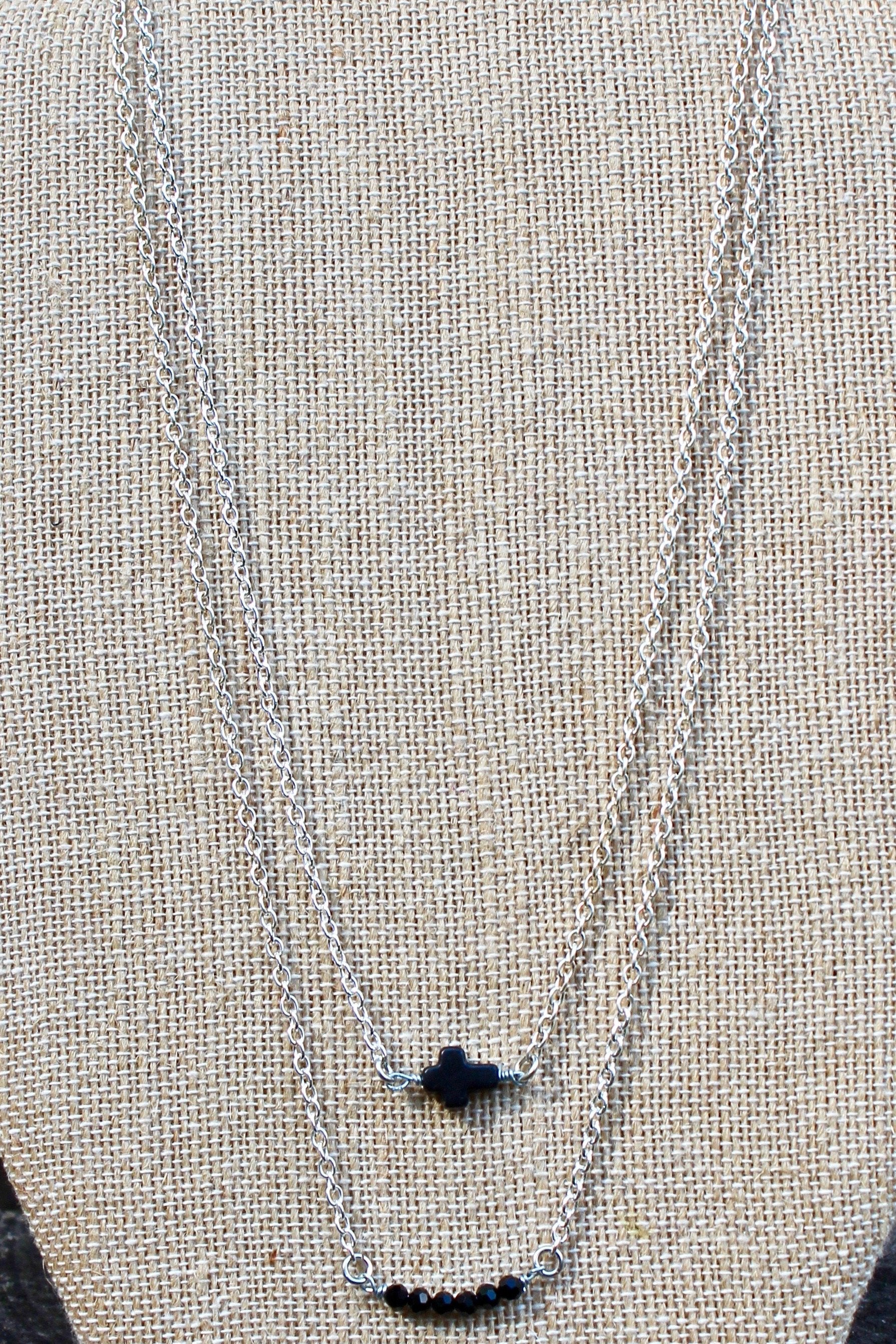N126SB; Black Stone Sideways Cross; Wired with Double Silvertone Chain; Approximately 16 inches; ; ; ; Majestees