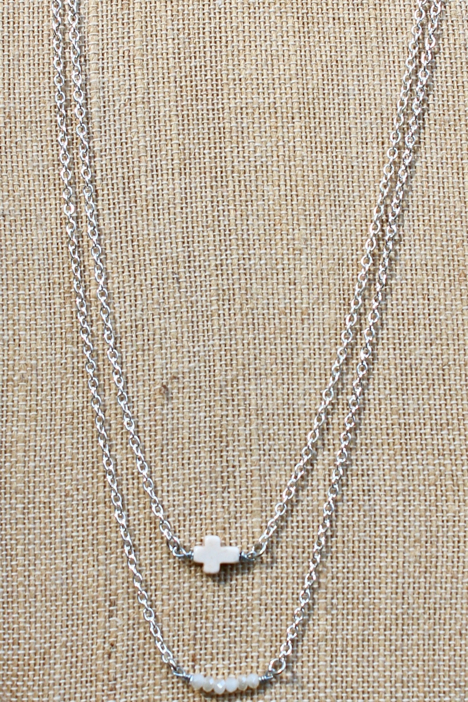 N126SW; White Stone Sideways Cross; Wired with Double Silvertone Chain; Approximately 16 inches; ; ; ; Majestees