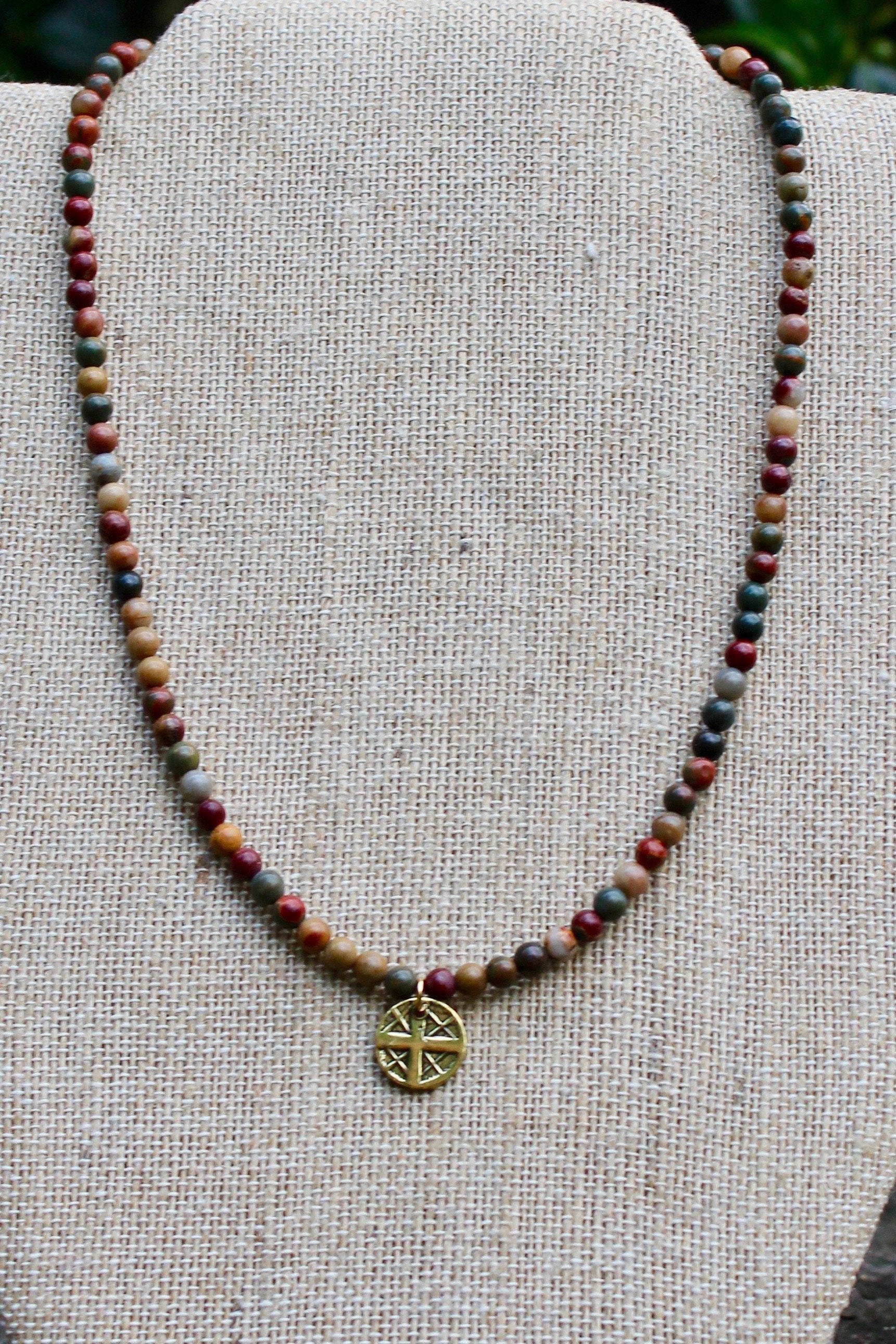 N138GE; Small Goldtone Round Cross ; 4mm Earthtone Picasso Jasper; Approximately 16 inches; ; ; ; Majestees
