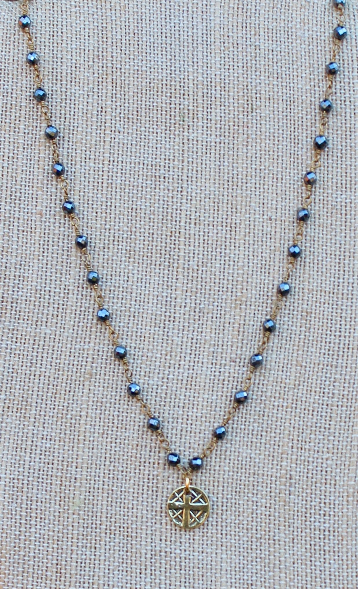 N140GH; Small Goldtone Round Cross ; 3mm Goldtone Hematite Chain; Approximately 16 inches; ; ; ; Majestees