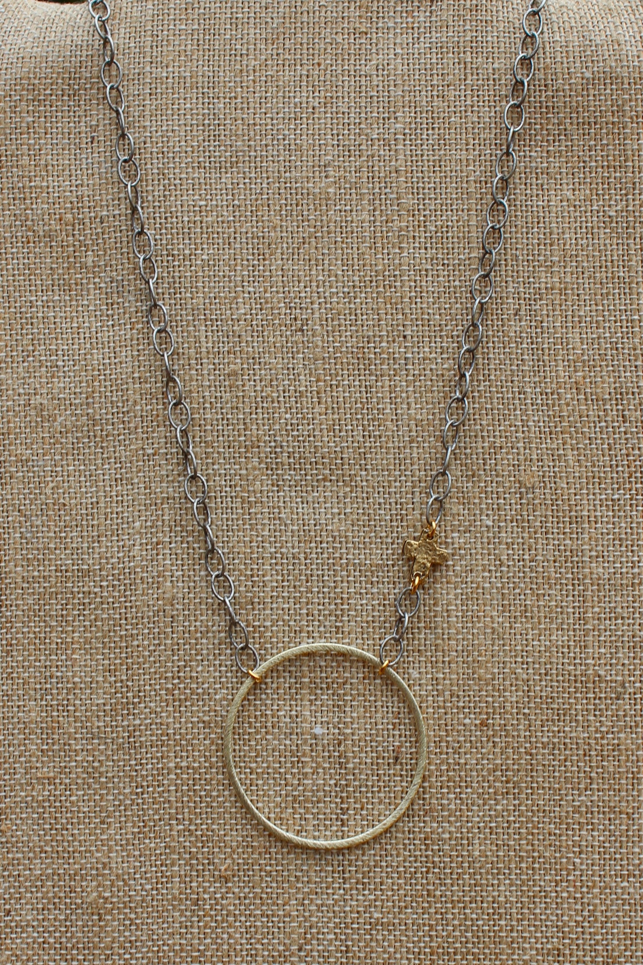N147G; Goldtone Circle and Cross; Silvertone Chain; Approximately 17 inches; 2 inch extender included; ; ; Majestees
