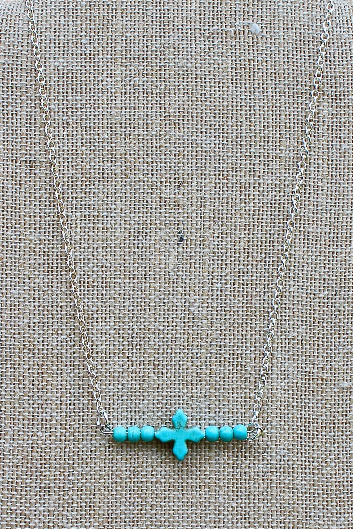 N150ST; Turquoise Stone Cross; Beads; Silvertone Chain; Approximately 16 inches; ; ; Majestees